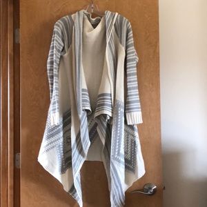 Asymmetrical sweater.